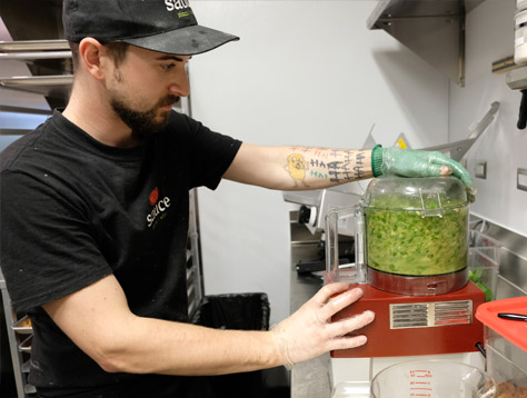 Sauce Team Member preparing food