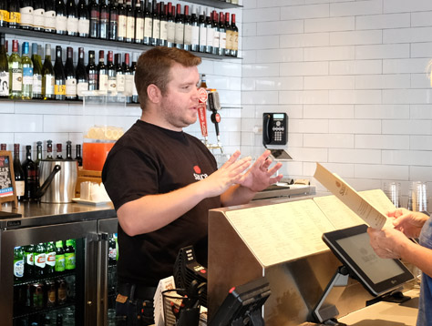 Sauce Team Member behind the bar