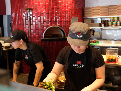 Sauce Team Members preparing food