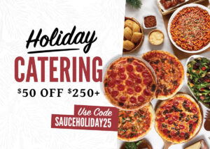 An array of pizza, pasta, salads, and sides availble for Sauce Pizza and Wine Holiday Catering.